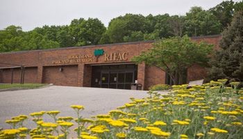 Exterior of Fitness & Activity Center with flowers